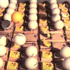 Still of ping pong balls from chain reaction video