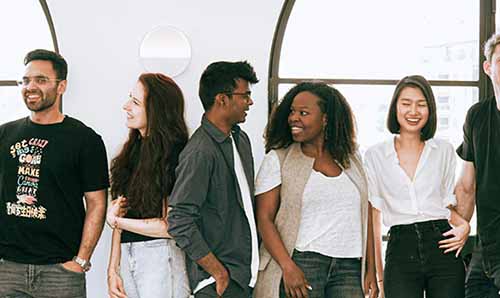 Stock photo of a group of young people of various ethnicities and sexes
