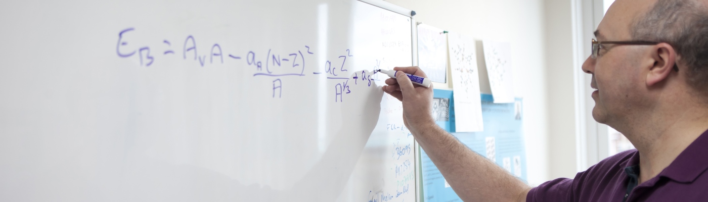 Academic writing formulations on a whiteboard
