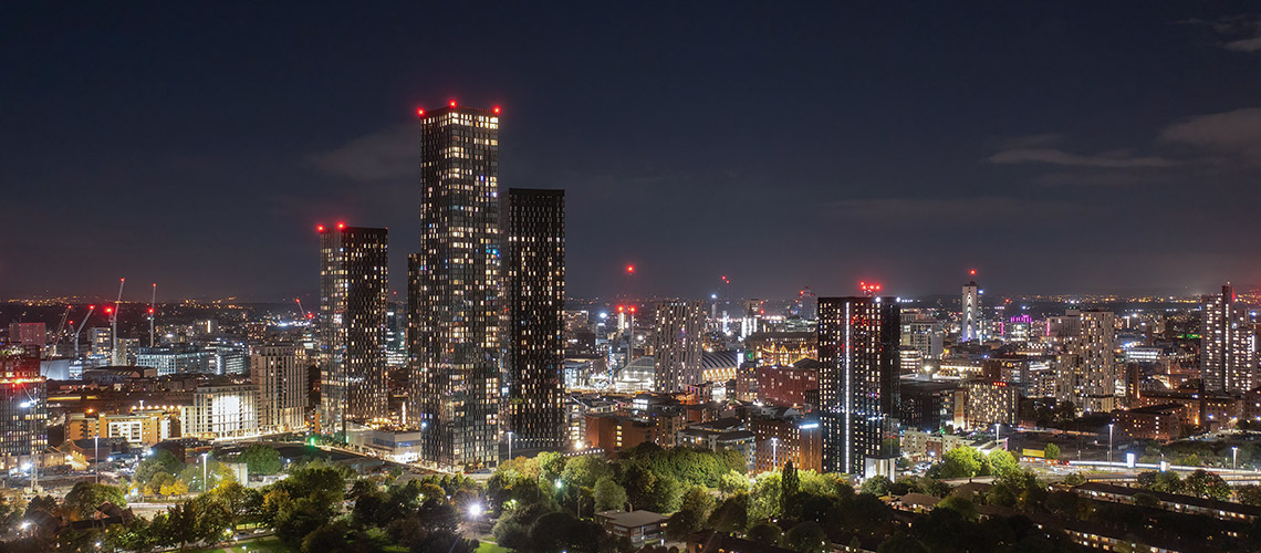 Cityscape view of central Manchester at night