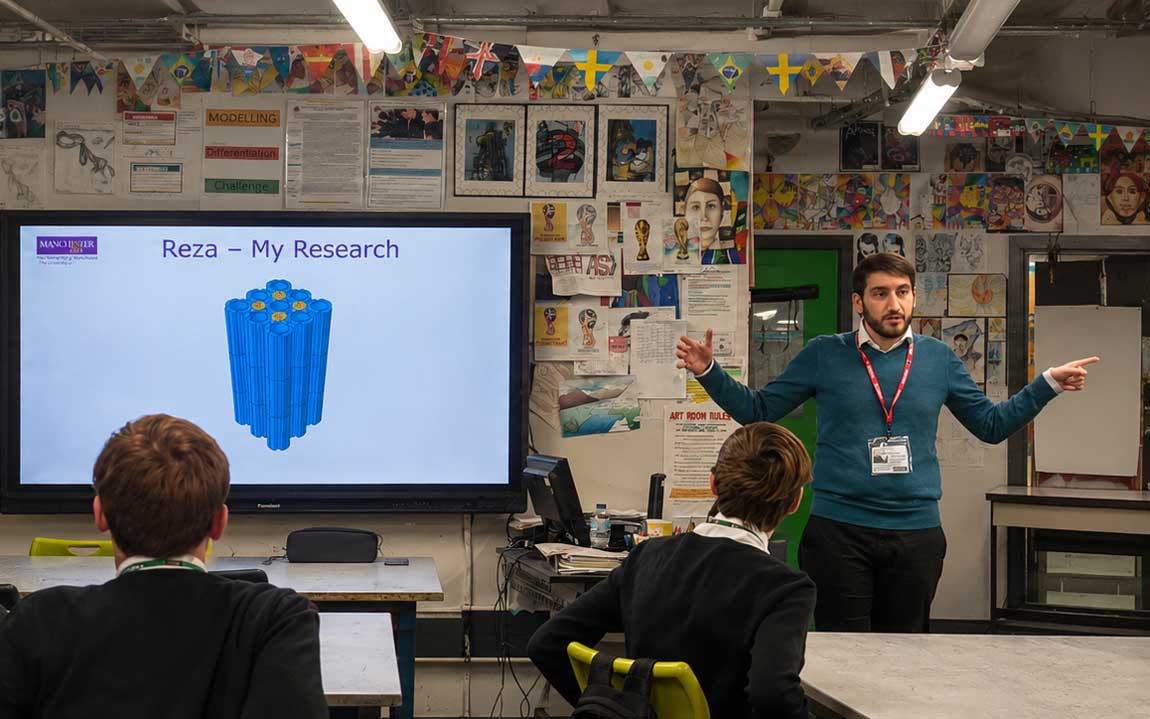 Dalton's researcher presenting his research to a class of high school children.