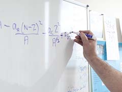 Academic writing formulations on a whiteboard