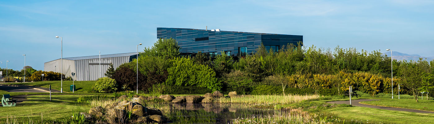 Dalton Cumbrian Facility viewed from field outside on a sunny day