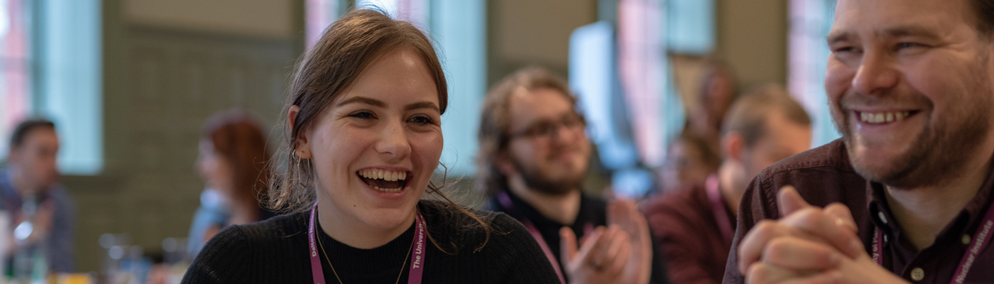 Students laughing at awards ceremony